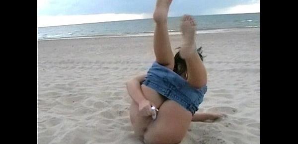  Beach babe Crystel Lei pissing pants and masturbating by the sea with naughty br
